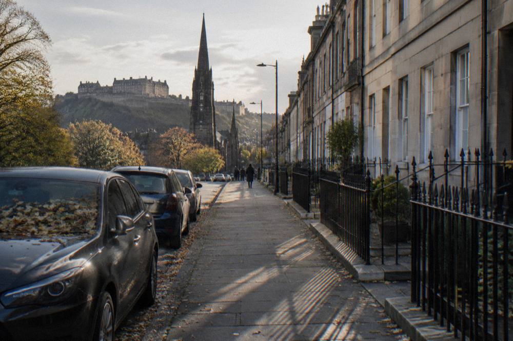 Georgian terrace street with parked cars in central Edinburgh New Town