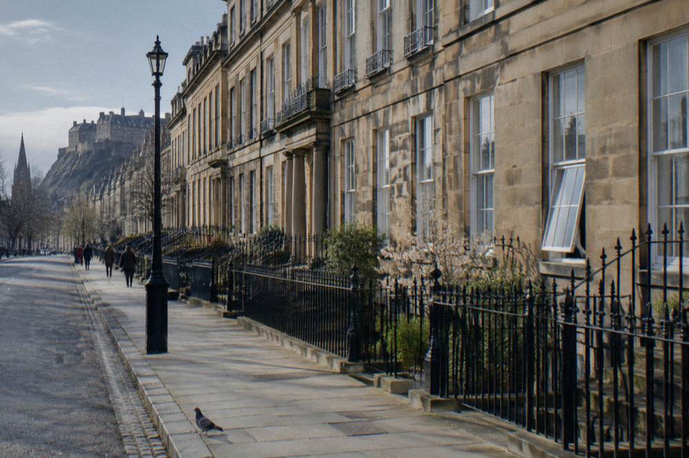 Georgian terrace street in Edinburgh New Town with uniform stone facades
