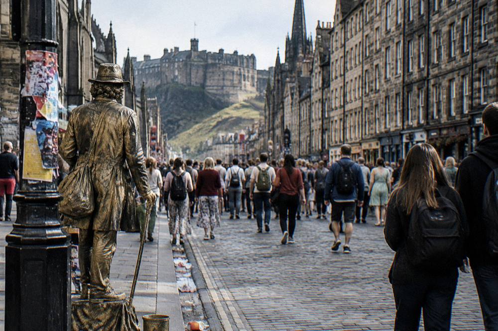 Crowded Royal Mile during the festival with performers and visitors