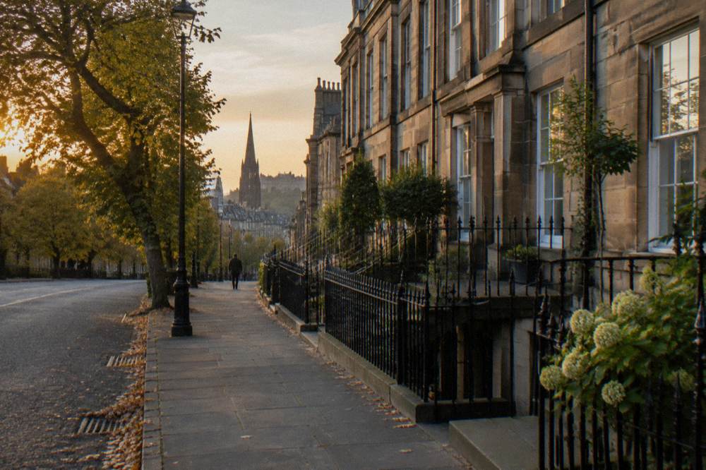 Stone terrace of Georgian townhouses on a quiet New Town street in Edinburgh