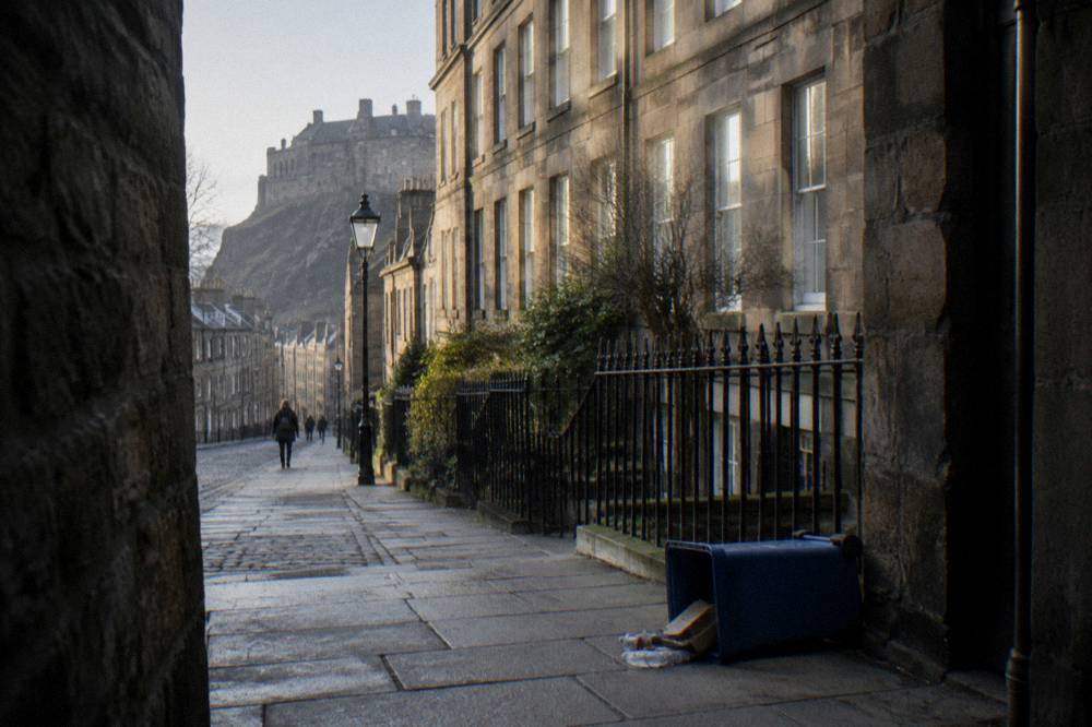 Georgian-style apartment buildings on a quiet street near the Royal Mile