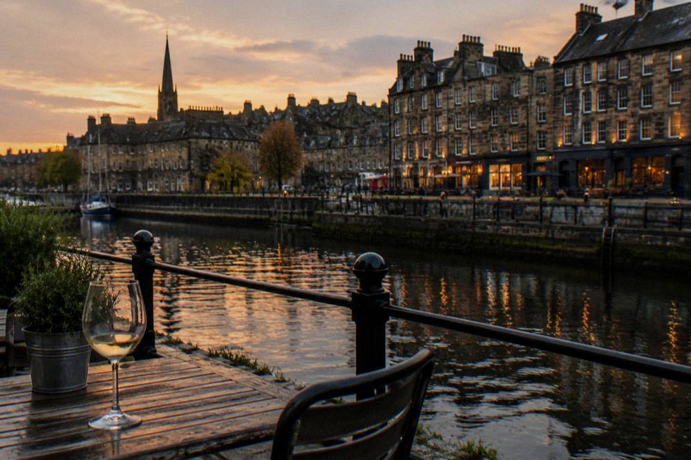 Evening light over The Shore in Leith with restaurant fronts along the quay