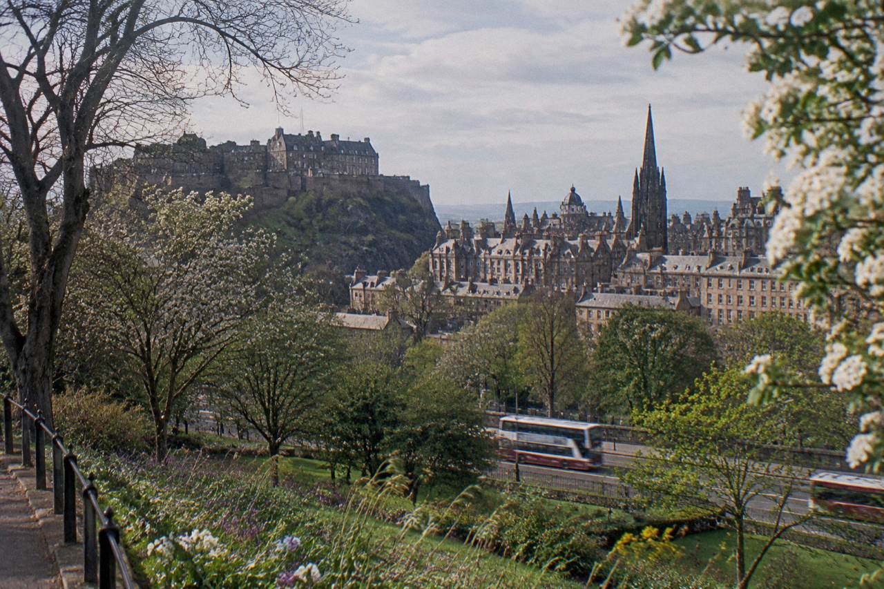 View from Princes Street towards Edinburgh Castle and the Old Town skyline above gardens