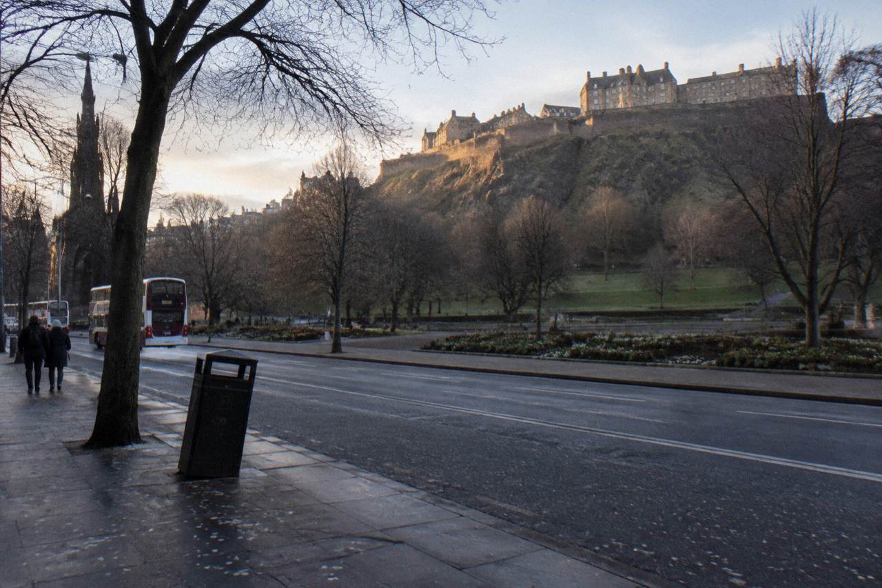 Princes Street in Edinburgh with gardens and the castle on the hill beyond
