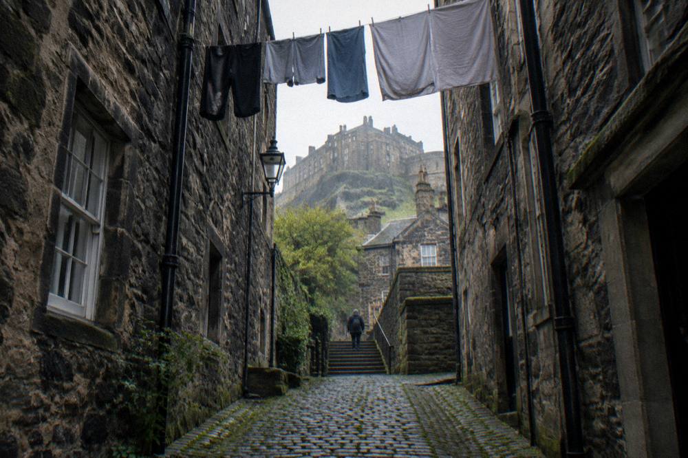 Cobbled close and stone tenement walls in the medieval Old Town